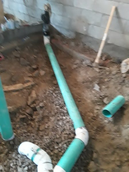 Sub-floor drain line replacement